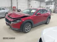 ✅ 2022 Mazda CX-30 S Premium • VIN: 3MVDMBDL0NM412458 • Lot: 43196761. Wystawiony na IAAI z przebiegiem 24 089 mil. Bezpłatny archiwum sprzedaży aukcyjnych z USA i szczegółowy raport historii pojazdu na DreamBid. Zdjęcie 2.