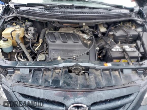 ✅ 2005 Mazda MPV ES • VIN: JM3LW28J850538092 • Лот: 95027945. Опубликован ранее на Copart с пробегом 98 997 миль. Бесплатный доступ к архиву аукционных продаж из США и подробный отчёт об истории автомобиля на DreamBid. Изображение 12.