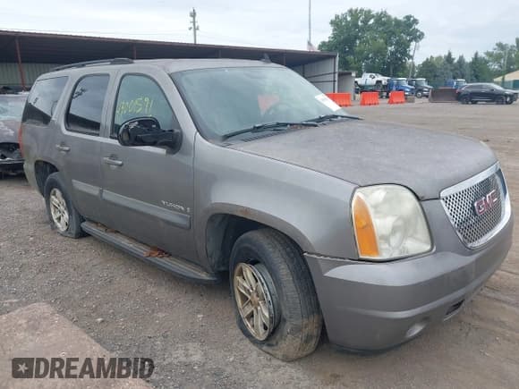 ✅ 2007 GMC Yukon SLT • VIN: 1GKFK13047R143047 • Lot: 43001591. Listed on IAAI with 261,740 mi. Free auction sales archive from the USA and detailed vehicle history report at DreamBid. Image 1.