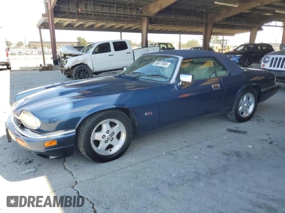 ✅ 1995 Jaguar XJS • VIN: SAJNX2746SC221871 • Lot: 69617935. Listed on Copart with 85,797 mi. Free auction sales archive from the USA and detailed vehicle history report at DreamBid. Image 1.
