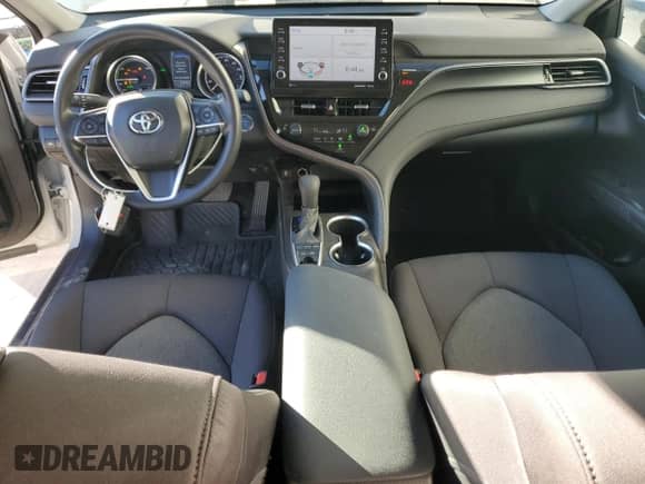 2023 Toyota Camry Hybrid LE with VIN 4T1H31AKXPU058812, listed as a Copart auction lot 85179135 with 21,816 mi miles and Salvage title. Bid and sale history available at DreamBid. Image 8.