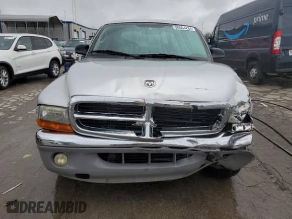 2002 Dodge Dakota SLT z VIN 1B7HL48X72S584617, wystawiony jako Copart lot #86504284 z przebiegiem 236 216 mil mil oraz Szkoda całkowita • Salvage title. Historia ofert i sprzedaży dostępna na DreamBid. Obrazek 5.