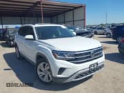 ✅ 2021 Volkswagen Atlas SE • VIN: 1V2JR2CA1MC591596 • Lot: 43369790. Listed on IAAI with 77,366 mi. Free auction sales archive from the USA and detailed vehicle history report at DreamBid. Image 1.