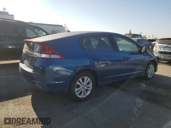 ✅ 2014 Honda Insight • VIN: JHMZE2H30ES001470 • Лот: 66953155. Опубликован ранее на Copart с пробегом 113 854 миль. Бесплатный доступ к архиву аукционных продаж из США и подробный отчёт об истории автомобиля на DreamBid. Изображение 3.