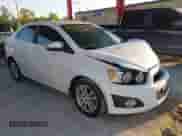2014 Chevrolet Sonic LT with VIN 1G1JC5SG9E4127762, listed as a IAAI auction lot 43521388 with 128,333 mi miles and . Bid and sale history available at DreamBid. Image 1.