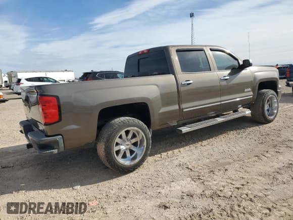 ✅ 2014 Chevrolet Silverado 1500 High Country • VIN: 3GCUKTEC0EG394943 • Лот: 87604505. Опубликован ранее на Copart с пробегом 123 650 миль. Бесплатный доступ к архиву аукционных продаж из США и подробный отчёт об истории автомобиля на DreamBid. Изображение 3.