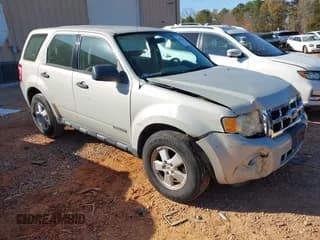 ✅ 2008 Ford Escape XLS • VIN: 1FMCU02Z28KB85029 • Lot: 43674674. Listed on IAAI with 102,069 mi. Free auction sales archive from the USA and detailed vehicle history report at DreamBid. Image 1.