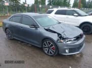 ✅ 2014 Volkswagen Jetta GLI • VIN: 3VW4T7AJ2EM208598 • Lot: 42381855. Listed on IAAI with 82,761 mi. Free auction sales archive from the USA and detailed vehicle history report at DreamBid. Image 1.