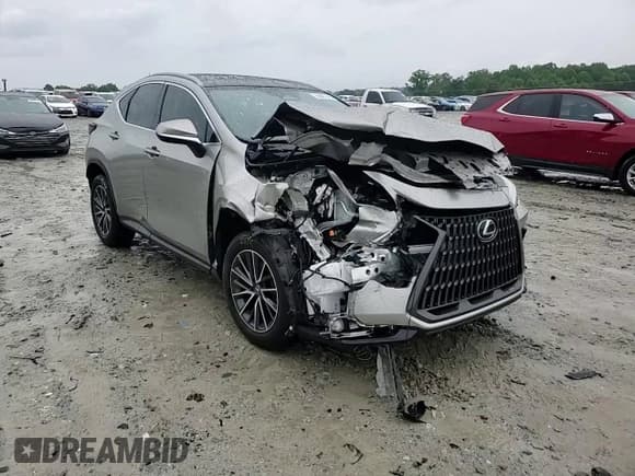 ✅ 2024 Lexus NX 350h Luxury • VIN: JTJHKCEZ0R2022701 • Lot: 58807345. Listed on Copart with 22,078 mi. Free auction sales archive from the USA and detailed vehicle history report at DreamBid. Image 14.
