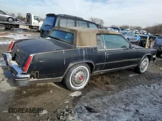 ✅ 1984 Cadillac Eldorado • VIN: 1G6AL5784EE626474 • Лот: 89302645. Опубликован ранее на Copart с пробегом 23 856 миль. Бесплатный доступ к архиву аукционных продаж из США и подробный отчёт об истории автомобиля на DreamBid. Изображение 3.