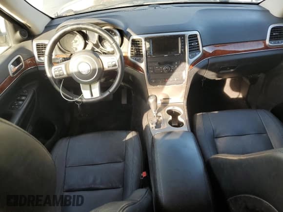 ✅ 2012 Jeep Grand Cherokee Limited • VIN: 1C4RJFBG9CC267710 • Лот: 92069085. Опубликован ранее на Copart с пробегом 211 969 миль. Бесплатный доступ к архиву аукционных продаж из США и подробный отчёт об истории автомобиля на DreamBid. Изображение 8.