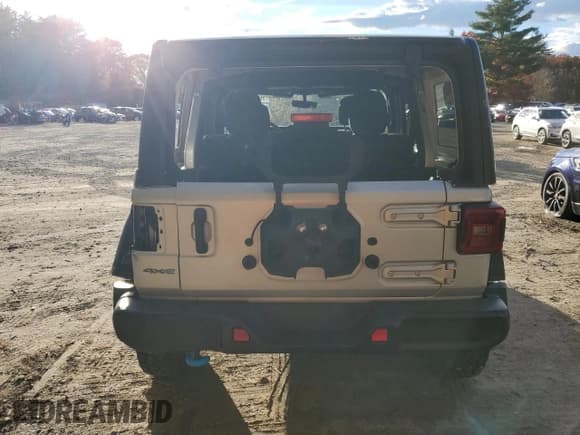 ✅ 2023 Jeep Wrangler Rubicon • VIN: 1C4JJXR61PW630974 • Lot: 90245445. Listed on Copart with 57,589 mi. Free auction sales archive from the USA and detailed vehicle history report at DreamBid. Image 6.