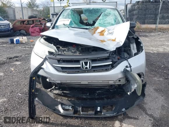 ✅ 2014 Honda CR-V LX • VIN: 2HKRM4H35EH604896 • Lot: 43590334. Listed on IAAI with 114,073 mi. Free auction sales archive from the USA and detailed vehicle history report at DreamBid. Image 12.