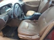 ✅ 1997 Ford Taurus LX • VIN: 1FALP53S1VG148018 • Lot: 67036654. Listed on Copart with 166,162 mi. Free auction sales archive from the USA and detailed vehicle history report at DreamBid. Image 7.