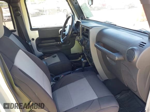 ✅ 2007 Jeep Wrangler Unlimited Sahara • VIN: 1J4GA591X7L101991 • Lot: 43233527. Listed on IAAI with 156,024 mi. Free auction sales archive from the USA and detailed vehicle history report at DreamBid. Image 5.