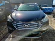 ✅ 2017 Hyundai Santa Fe 2.4L • VIN: 5XYZUDLB3HG462560 • Lot: 89849245. Listed on Copart with 76,475 mi. Free auction sales archive from the USA and detailed vehicle history report at DreamBid. Image 5.