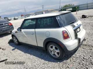 2009 MINI Hardtop with VIN WMWMF33539TT69081, listed as a Copart auction lot 58087205 with 106,470 mi miles and Salvage title. Bid and sale history available at DreamBid. Image 2.