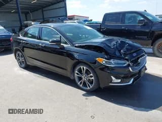 ✅ 2020 Ford Fusion Titanium • VIN: 3FA6P0D98LR130830 • Lot: 43310733. Listed on IAAI with 92,364 mi. Free auction sales archive from the USA and detailed vehicle history report at DreamBid. Image 1.