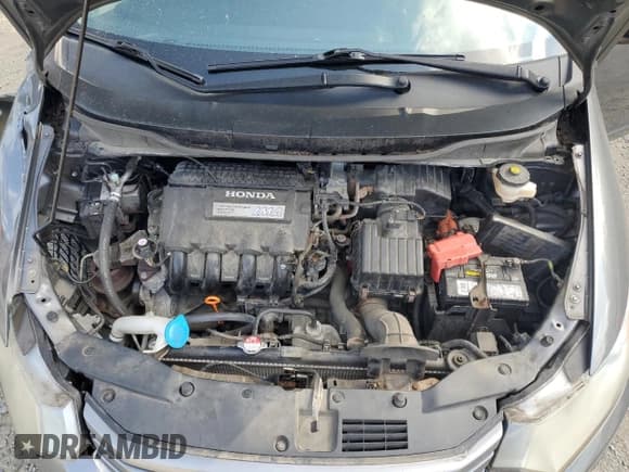 ✅ 2010 Honda Insight LX • VIN: JHMZE2H52AS036670 • Lot: 80099915. Wystawiony na Copart z przebiegiem 100 193 mil. Bezpłatny archiwum sprzedaży aukcyjnych z USA i szczegółowy raport historii pojazdu na DreamBid. Zdjęcie 12.