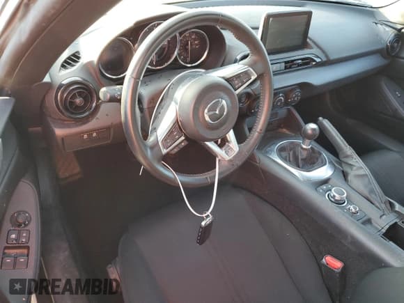 ✅ 2020 Mazda MX-5 Miata Sport • VIN: JM1NDAB79L0411153 • Lot: 77241024. Listed on Copart with Not provided. Free auction sales archive from the USA and detailed vehicle history report at DreamBid. Image 8.