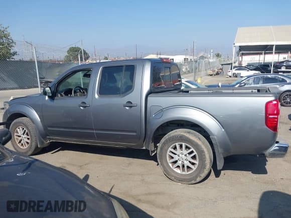 ✅ 2018 Nissan Frontier SV • VIN: 1N6AD0ER9JN761322 • Lot: 42995099. Listed on IAAI with 154,479 mi. Free auction sales archive from the USA and detailed vehicle history report at DreamBid. Image 14.