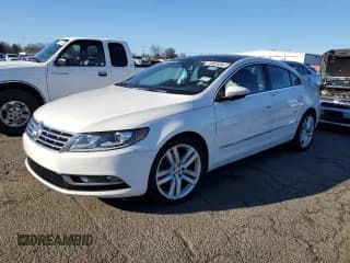 ✅ 2014 Volkswagen CC Executive • VIN: WVWRP7AN6EE528612 • Lot: 84805884. Listed on Copart with 92,024 mi. Free auction sales archive from the USA and detailed vehicle history report at DreamBid. Image 1.