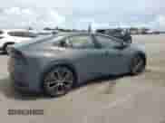 2024 Toyota Prius LE with VIN JTDACAAU5R3025104, listed as a Copart auction lot 65556565 with 18,003 mi miles and Salvage title. Bid and sale history available at DreamBid. Image 3.