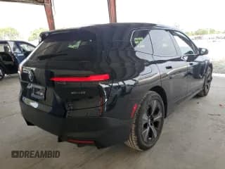 ✅ 2023 BMW iX xDrive50 • VIN: WB523CF08PCL23354 • Lot: 67861052. Wystawiony na Copart z przebiegiem 718 mil. Bezpłatny archiwum sprzedaży aukcyjnych z USA i szczegółowy raport historii pojazdu na DreamBid. Zdjęcie 3.