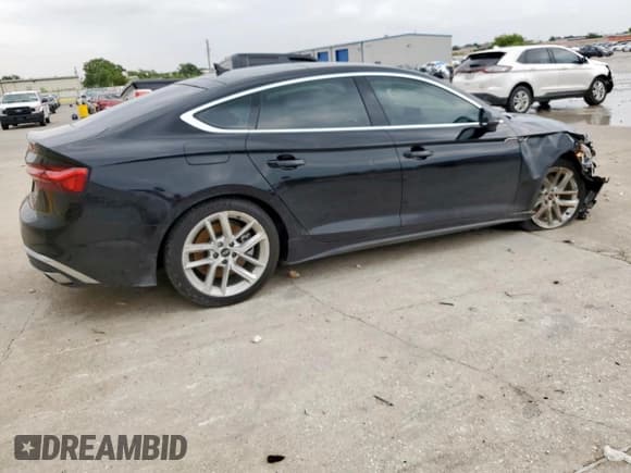 ✅ 2023 Audi A5 Sportback S line Premium Plus • VIN: WAUFACF55PA050051 • Lot: 69738675. Listed on Copart with 23,995 mi. Free auction sales archive from the USA and detailed vehicle history report at DreamBid. Image 3.