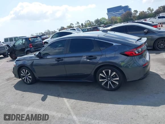 ✅ 2023 Honda Civic EX-L • VIN: 19XFL1H78PE016960 • Lot: 41896709. Listed on IAAI with 22,841 mi. Free auction sales archive from the USA and detailed vehicle history report at DreamBid. Image 14.