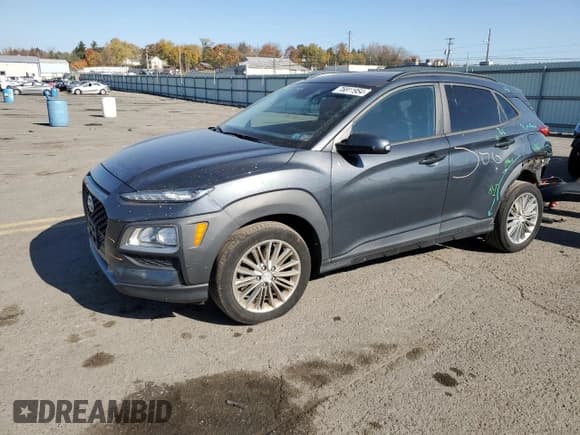 ✅ 2019 Hyundai Kona SEL • VIN: KM8K6CAA2KU351466 • Лот: 76811954. Опубликован ранее на Copart с пробегом 55 588 миль. Бесплатный доступ к архиву аукционных продаж из США и подробный отчёт об истории автомобиля на DreamBid. Изображение 1.