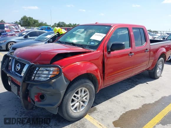 ✅ 2014 Nissan Frontier SV • VIN: 1N6AD0FR1EN766633 • Lot: 42453514. Listed on IAAI with 96,811 mi. Free auction sales archive from the USA and detailed vehicle history report at DreamBid. Image 2.