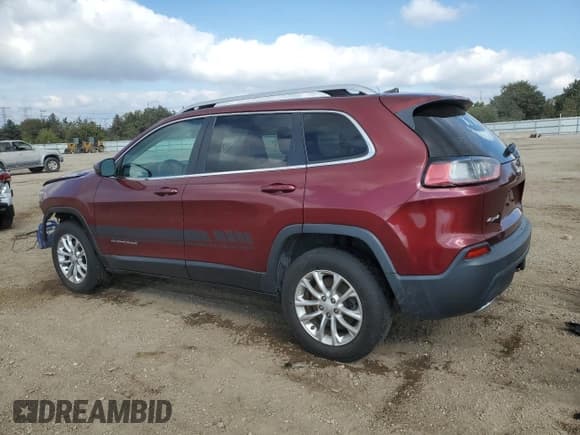 ✅ 2019 Jeep Cherokee Latitude • VIN: 1C4PJMCXXKD331384 • Lot: 86657665. Listed on Copart with 123,045 mi. Free auction sales archive from the USA and detailed vehicle history report at DreamBid. Image 2.