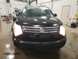 ✅ 2007 Suzuki XL7 • VIN: 2S3DB117776110396 • Лот: 84415474. Опубликован ранее на Copart с пробегом 128 395 миль. Бесплатный доступ к архиву аукционных продаж из США и подробный отчёт об истории автомобиля на DreamBid. Изображение 5.