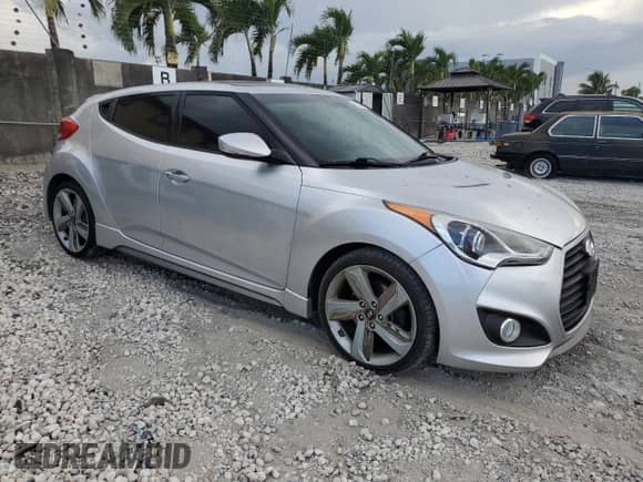 2013 Hyundai Veloster Turbo z VIN KMHTC6AE8DU123217, wystawiony jako Copart lot #69754965 z przebiegiem 11 088 mil mil oraz Czysty tytuł • Clean title. Historia ofert i sprzedaży dostępna na DreamBid. Obrazek 4.