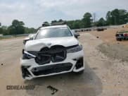 ✅ 2020 BMW X7 M50i • VIN: 5UXCX6C05L9C38130 • Lot: 71829275. Listed on Copart with 86,202 mi. Free auction sales archive from the USA and detailed vehicle history report at DreamBid. Image 14.