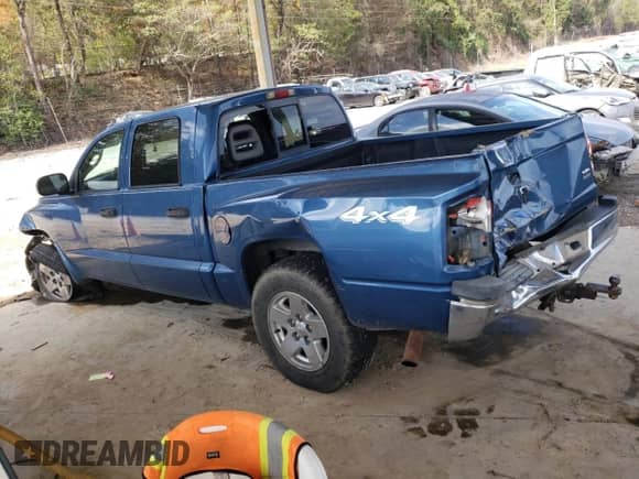 2005 Dodge Dakota SLT with VIN 1D7HW48N85S112443, listed as a Copart auction lot 79257864 with 194,022 mi miles and Salvage title. Bid and sale history available at DreamBid. Image 2.