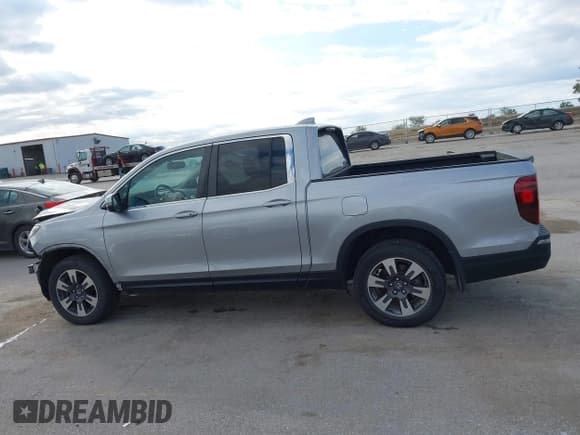 ✅ 2017 Honda Ridgeline RTL-T • VIN: 5FPYK3F60HB018044 • Lot: 43374137. Listed on IAAI with 115,043 mi. Free auction sales archive from the USA and detailed vehicle history report at DreamBid. Image 15.