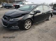 ✅ 2017 Chevrolet Cruze LT • VIN: 1G1BE5SM0H7262717 • Lot: 70741672. Listed on Copart with 104,057 mi. Free auction sales archive from the USA and detailed vehicle history report at DreamBid. Image 1.