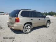 ✅ 2004 GMC Envoy SLE • VIN: 1GKES16S546231997 • Lot: 80627065. Listed on Copart with 252,215 mi. Free auction sales archive from the USA and detailed vehicle history report at DreamBid. Image 3.