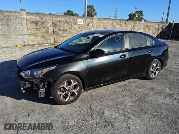 ✅ 2021 Kia Forte LXS • VIN: 3KPF24AD7ME349599 • Лот: 90785785. Опубликован ранее на Copart с пробегом 104 487 миль. Бесплатный доступ к архиву аукционных продаж из США и подробный отчёт об истории автомобиля на DreamBid. Изображение 1.