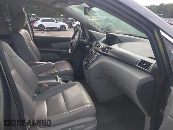 ✅ 2015 Honda Odyssey Touring Elite • VIN: 5FNRL5H9XFB041101 • Лот: 43063363. Опубликован ранее на IAAI с пробегом 162 011 миль. Бесплатный доступ к архиву аукционных продаж из США и подробный отчёт об истории автомобиля на DreamBid. Изображение 5.