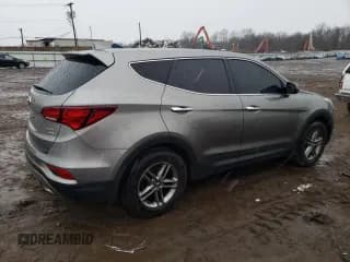 ✅ 2017 Hyundai Santa Fe 2.4L • VIN: 5XYZTDLB8HG413888 • Лот: 38315323. Опубликован ранее на Copart с пробегом 119 683 миль. Бесплатный доступ к архиву аукционных продаж из США и подробный отчёт об истории автомобиля на DreamBid. Изображение 3.