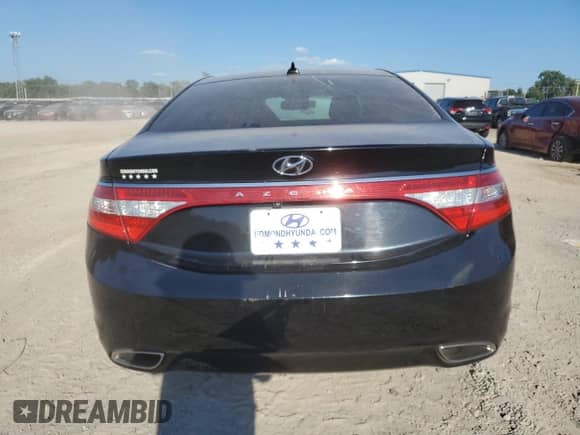 2013 Hyundai Azera z VIN KMHFG4JG7DA217419, wystawiony jako Copart lot #69759134 z przebiegiem 90 918 mil mil oraz Szkoda całkowita • Salvage title. Historia ofert i sprzedaży dostępna na DreamBid. Obrazek 6.