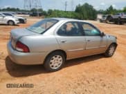 ✅ 2000 Nissan Sentra XE • VIN: 3N1CB51D1YL344637 • Lot: 61230975. Wystawiony na Copart z przebiegiem 129 460 mil. Bezpłatny archiwum sprzedaży aukcyjnych z USA i szczegółowy raport historii pojazdu na DreamBid. Zdjęcie 3.