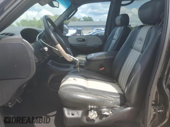 ✅ 2003 Ford F-150 Harley-Davidson • VIN: 1FTRW07393KC28559 • Lot: 55201835. Listed on Copart with 139,288 mi. Free auction sales archive from the USA and detailed vehicle history report at DreamBid. Image 7.