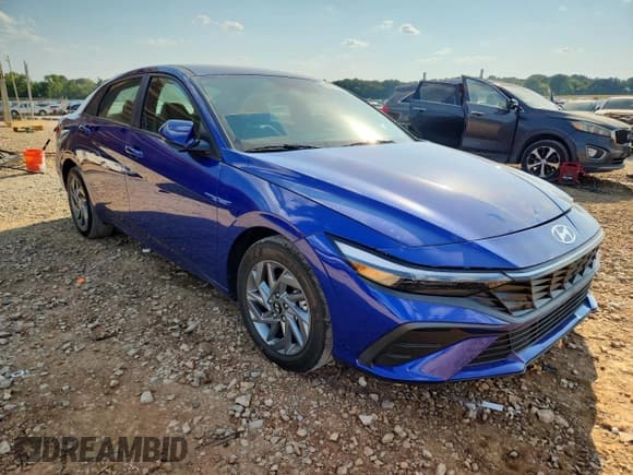 ✅ 2024 Hyundai Elantra Blue • VIN: KMHLM4DJ1RU102467 • Lot: 80209125. Listed on Copart with 21,298 mi. Free auction sales archive from the USA and detailed vehicle history report at DreamBid. Image 4.