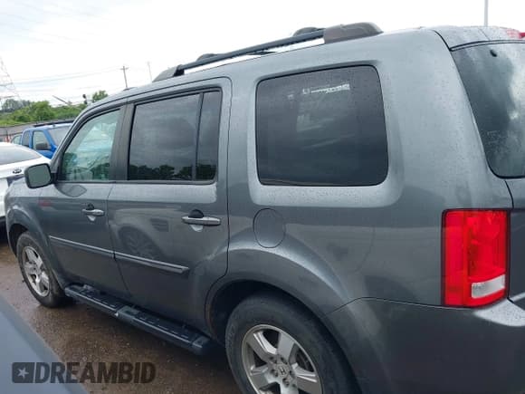 ✅ 2010 Honda Pilot EX-L • VIN: 5FNYF4H65AB006820 • Lot: 42644431. Listed on IAAI with 238,325 mi. Free auction sales archive from the USA and detailed vehicle history report at DreamBid. Image 14.