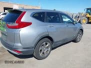 ✅ 2017 Honda CR-V EX-L • VIN: 7FARW1H86HE017621 • Лот: 42289917. Опубликован ранее на IAAI с пробегом 33 549 миль. Бесплатный доступ к архиву аукционных продаж из США и подробный отчёт об истории автомобиля на DreamBid. Изображение 4.