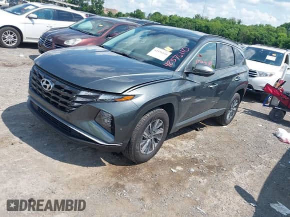 2023 Hyundai Tucson Blue z VIN KM8JBCA13PU117156, wystawiony jako IAAI lot #42376110 z przebiegiem 68 919 mil mil oraz . Historia ofert i sprzedaży dostępna na DreamBid. Obrazek 2.